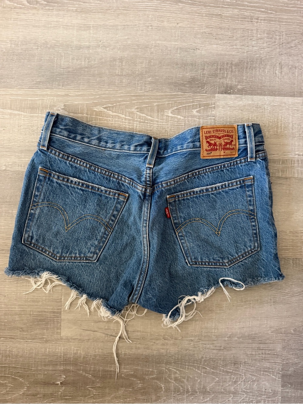 Levi's Distressed Denim Cutoff Shorts - Medium Blue